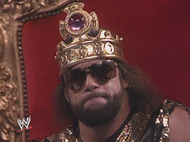 Macho Man Randy Savage, wearing a crown, nodding contentendly